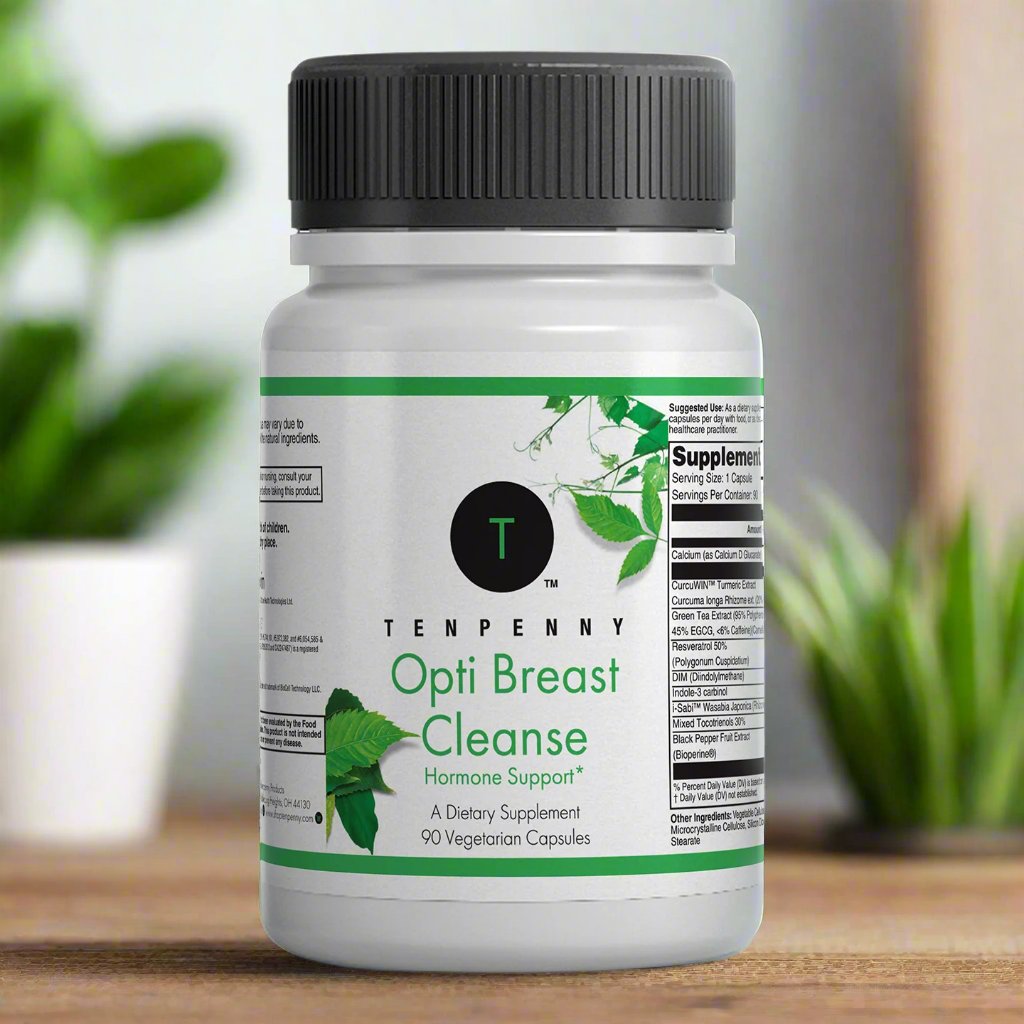 Supplement bottle labeled 'Opti Breast Cleanse' by Ten Penny on a wooden surface with plants in the background.