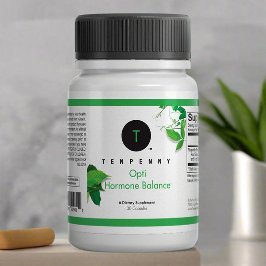 Bottle of Opti Hormone Balance supplement displayed in a natural setting, promoting daily hormone support.